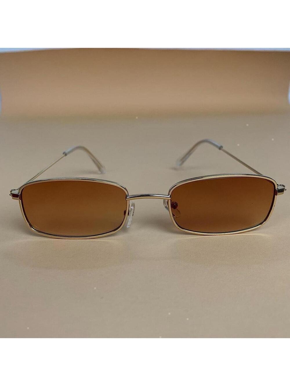 Brown and gold slim sunglasses. Brown trim with brown lenses. Glasses are - Picture 3 of 6